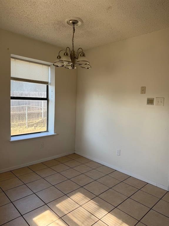 11204 Liberty School Road Pelican Bay, TX 76020 - Photo 9 of 23 a view of an empty room with a window