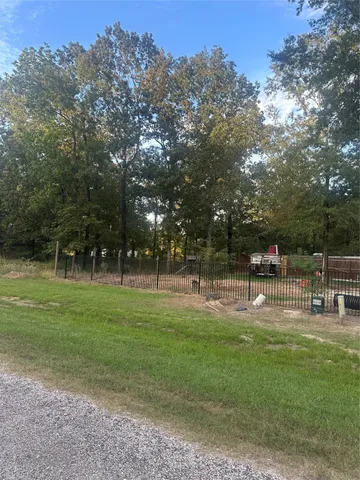 a view of park with swings and slides