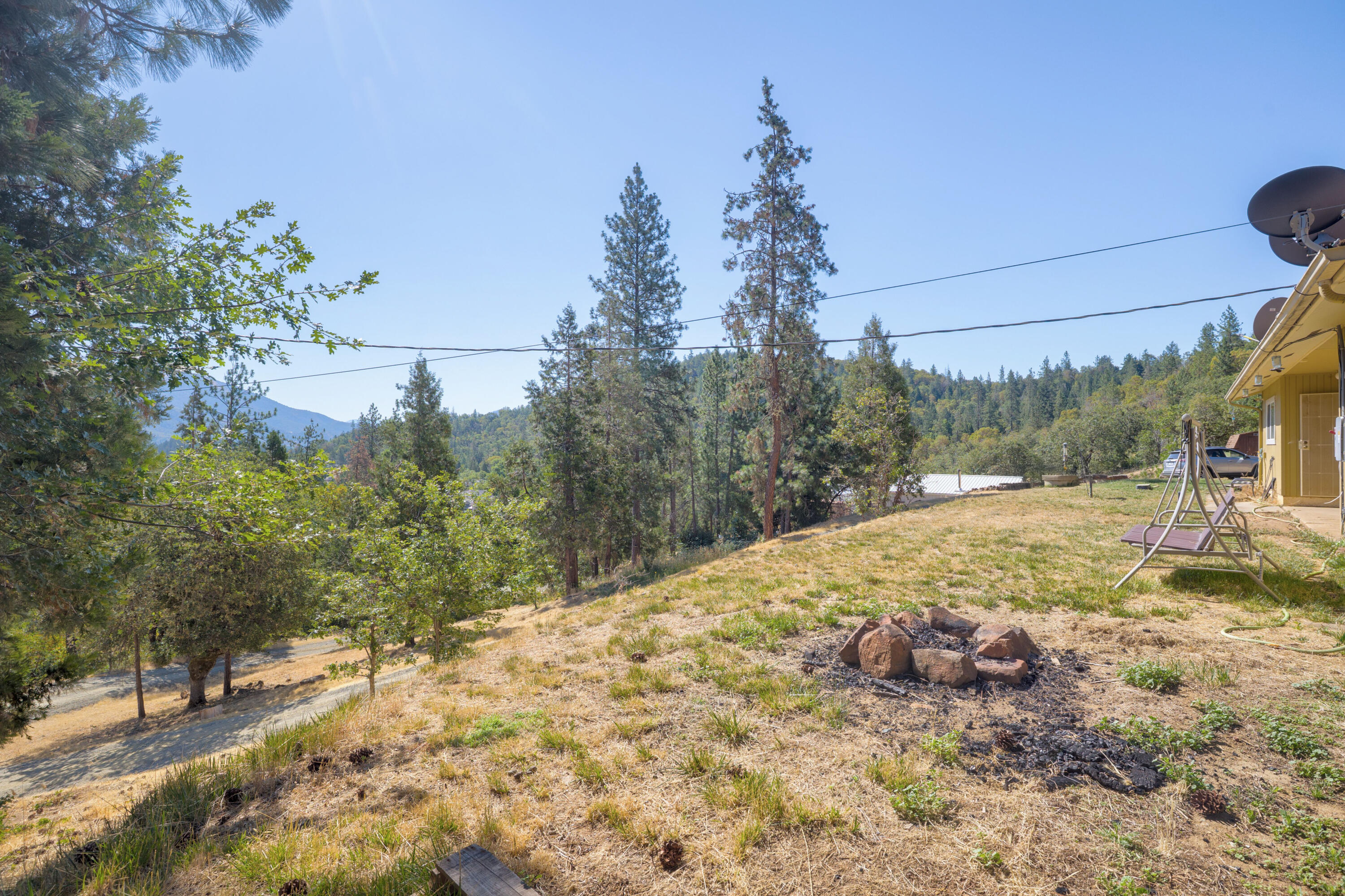 12748 Water Gap Road Williams, OR 97544 - Photo 26 of 35 a view of a yard with trees