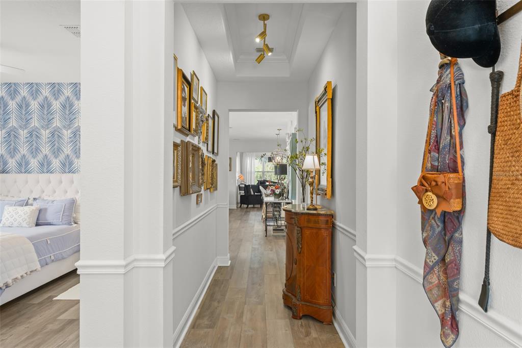 2983 Rapollo Lane Apopka, FL 32712 - Photo 12 of 62 a living room with furniture and a floor to ceiling window