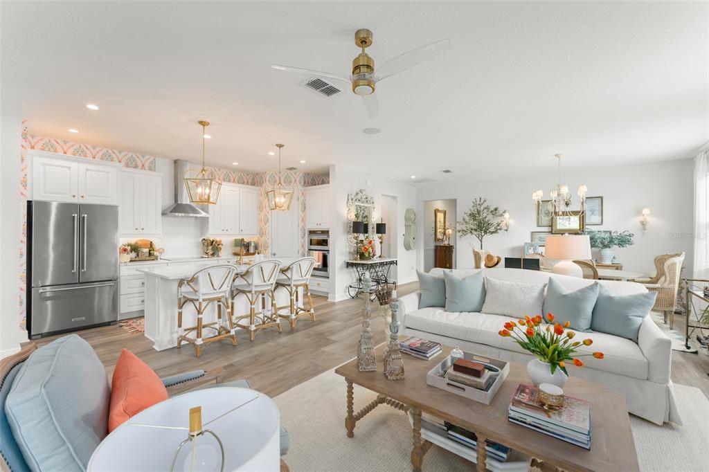 2983 Rapollo Lane Apopka, FL 32712 - Photo 22 of 62 a living room with furniture and kitchen view