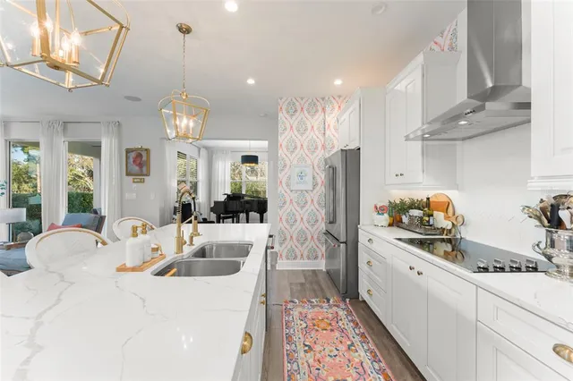 a bathroom with a sink mirror vanity and toilet