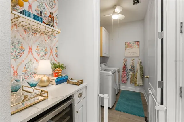 a spacious bedroom with a bed and a couch