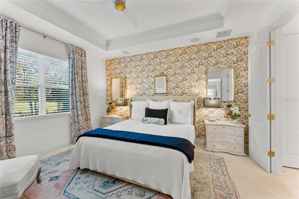 2983 Rapollo Lane Apopka, FL 32712 - Photo 37 of 62 a bedroom with a bed and a flat screen tv