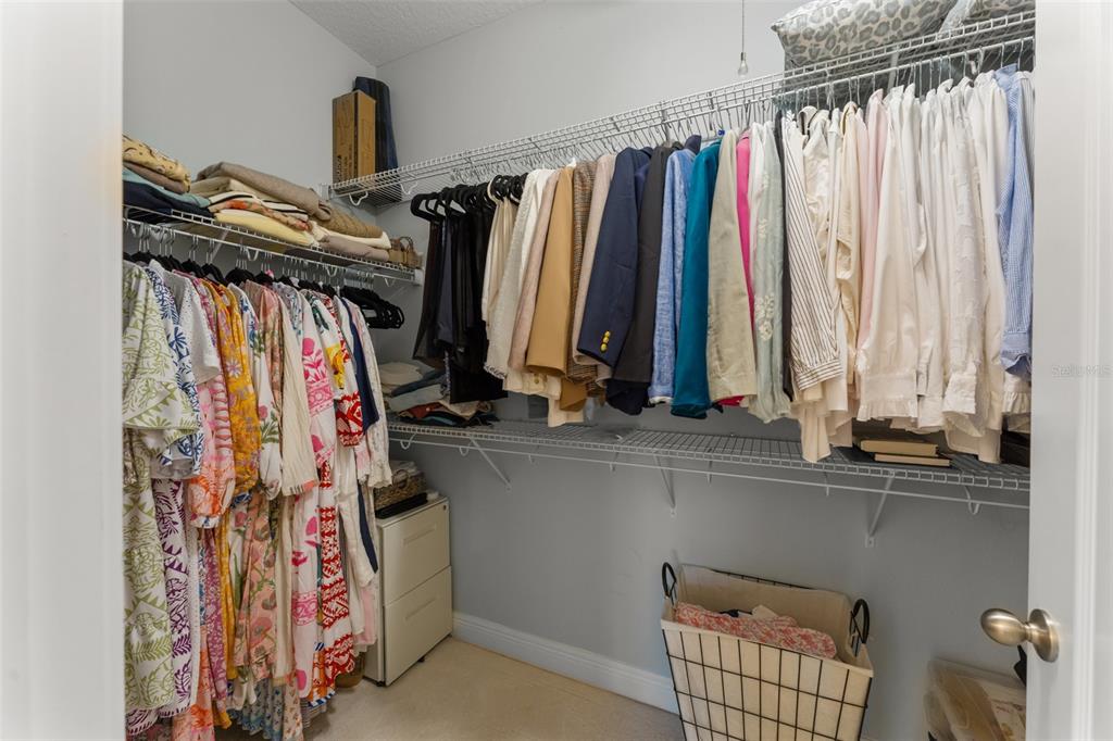 2983 Rapollo Lane Apopka, FL 32712 - Photo 43 of 62 a view of walk in closet with clothes and shoes