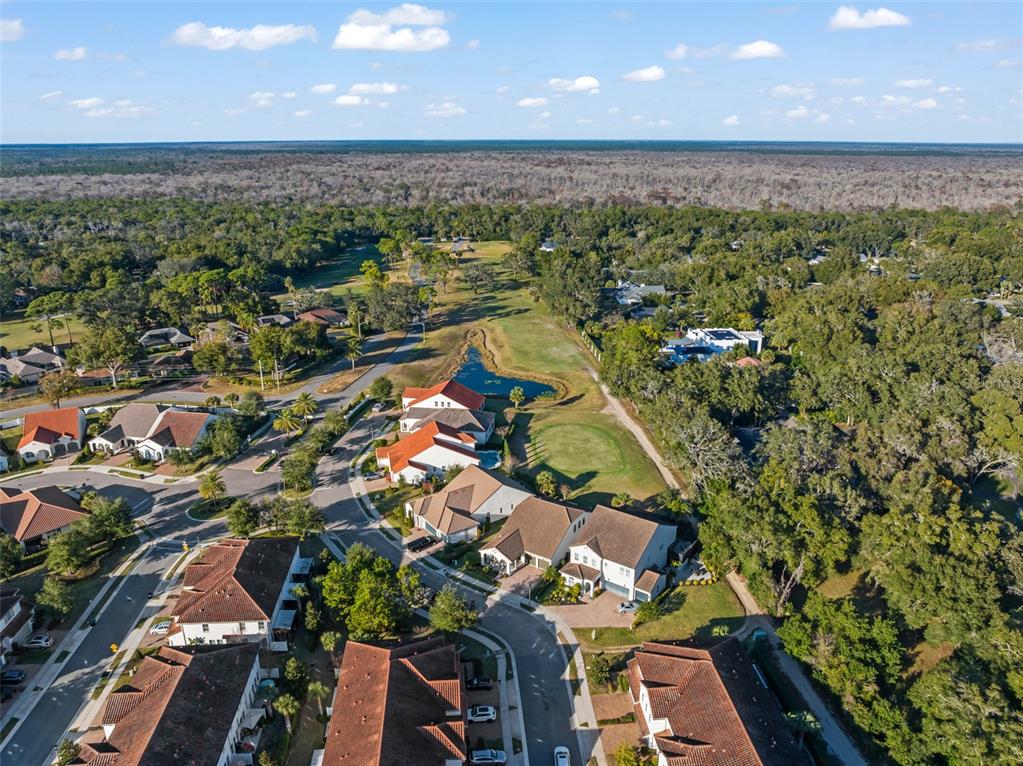 2983 Rapollo Lane Apopka, FL 32712 - Photo 58 of 62 an aerial view of a house with a lake view