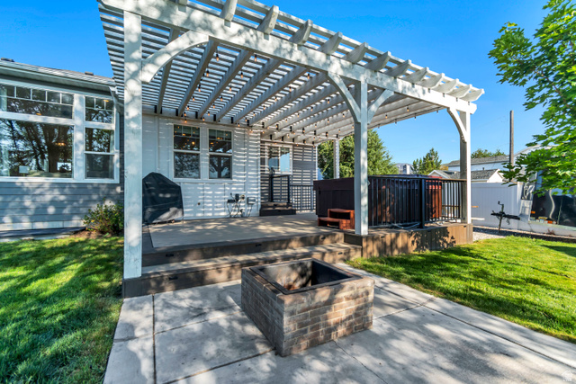 332 South 500 West Payson, UT 84651 - Photo 39 of 50 Patio area featuring a white pergola, elevated decking, built to hold a hot tub, and a fire pit
