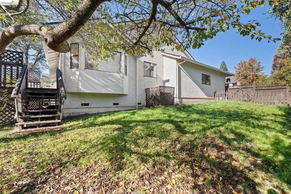 a view of a chairs and table on the deck
