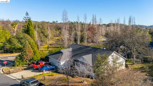 a view of a city with mountains in the background
