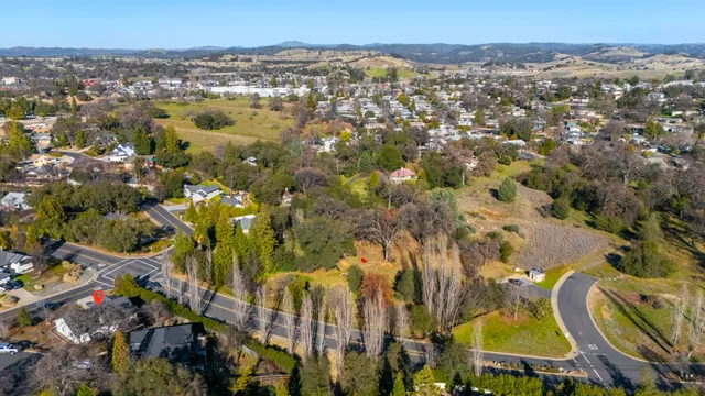 a view of a swimming pool with mountains in the background