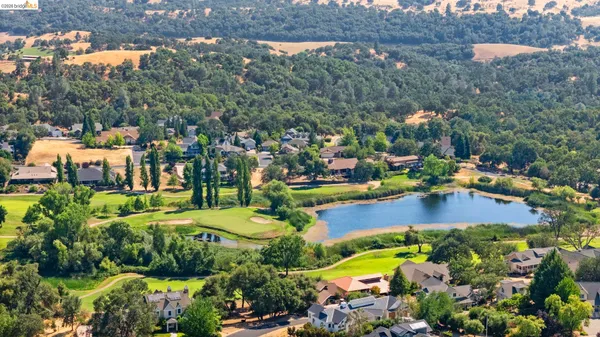 a view of a city with mountains in the background