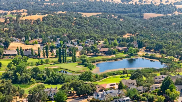 a view of a city with mountains in the background