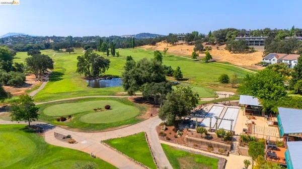 an aerial view of mountain with outdoor space