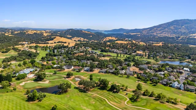 a view of a city with mountains in the background