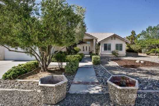 1214 North Guam Street Ridgecrest, CA 93555 - Photo 47 of 48 a view of a house with backyard and sitting area