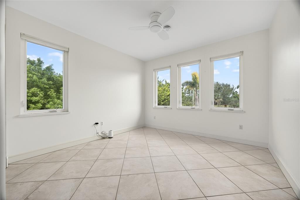 15435 Appleton Boulevard Port Charlotte, FL 33981 - Photo 19 of 51 a view of an empty room with a window