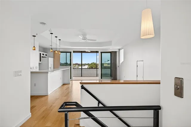 a view of a kitchen with furniture and large window