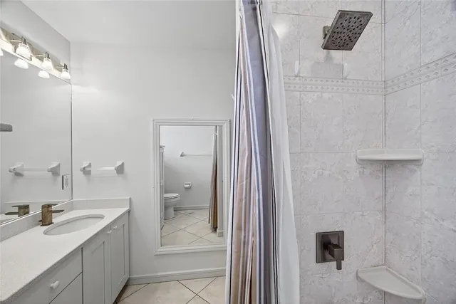 a view of a kitchen with cabinets