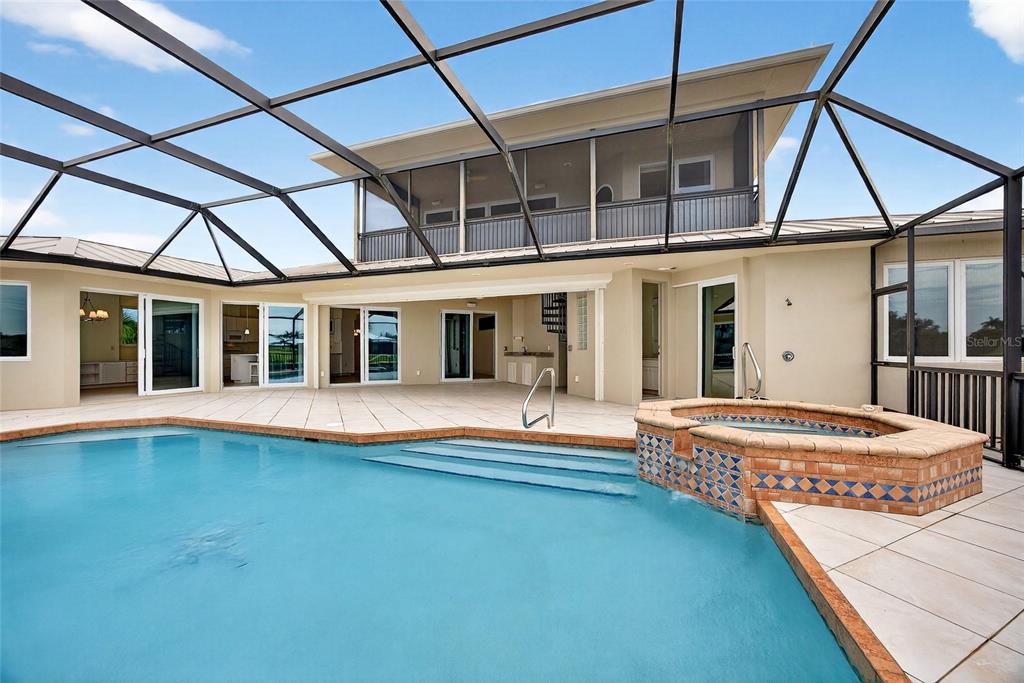 15435 Appleton Boulevard Port Charlotte, FL 33981 - Photo 37 of 51 a view of a house with a swimming pool