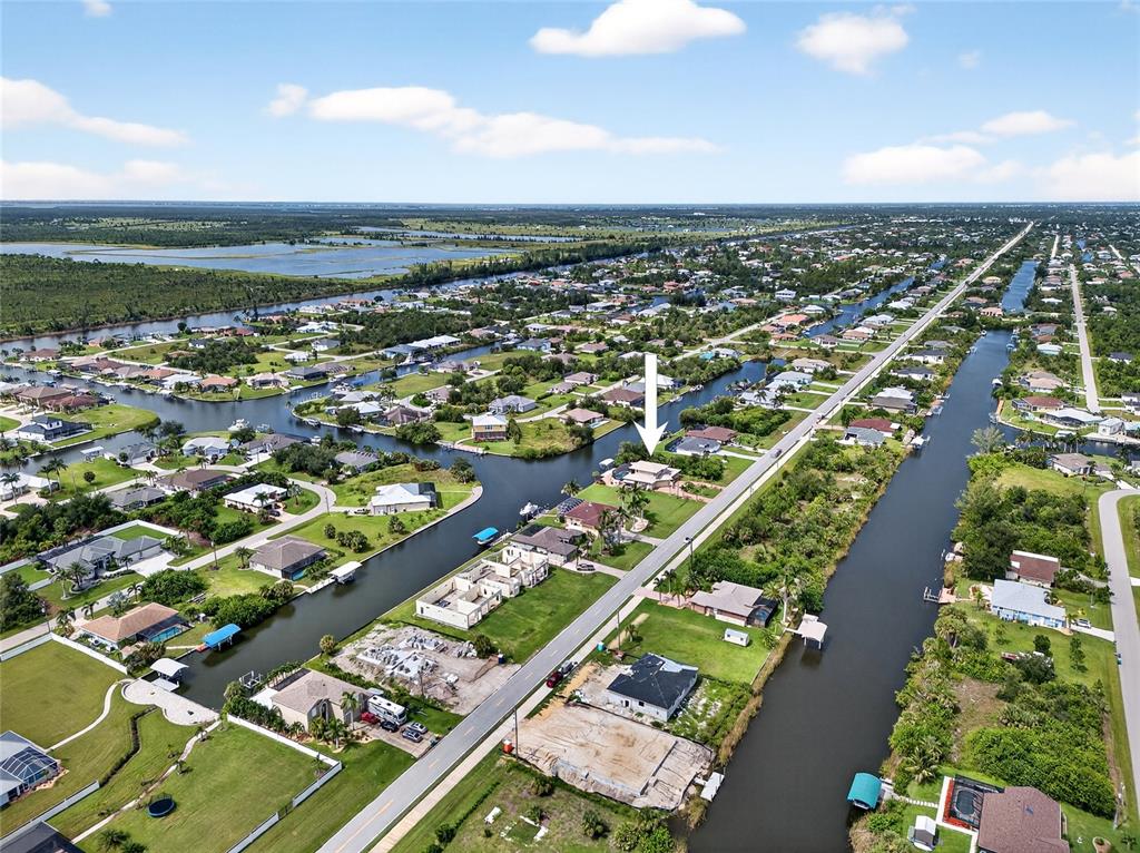 15435 Appleton Boulevard Port Charlotte, FL 33981 - Photo 45 of 49 an aerial view of residential building and ocean