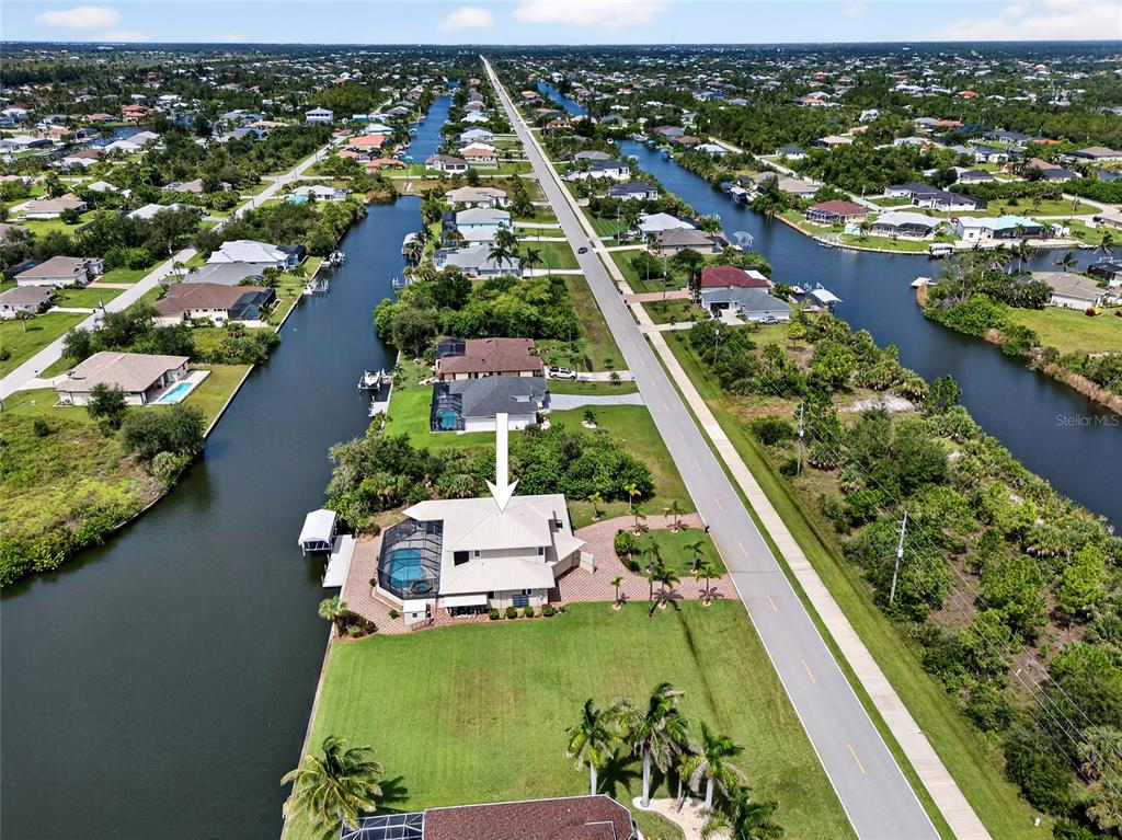 15435 Appleton Boulevard Port Charlotte, FL 33981 - Photo 46 of 49 an aerial view of residential houses with outdoor space