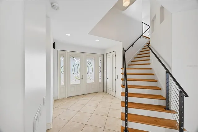 a view of an entryway with staircase