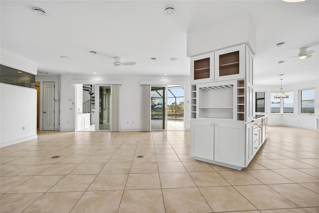 15435 Appleton Boulevard Port Charlotte, FL 33981 - Photo 7 of 49 a view of a livingroom with kitchen appliances and furniture