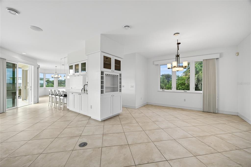 15435 Appleton Boulevard Port Charlotte, FL 33981 - Photo 8 of 49 a view of kitchen with furniture and chandelier