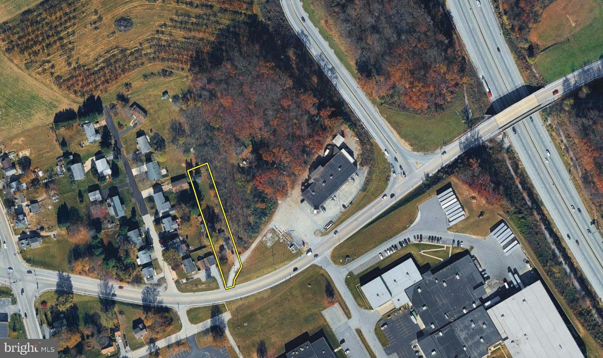 105 North Street York, PA 17403 - Photo 37 of 38 a view of a backyard with brick wall and seating area