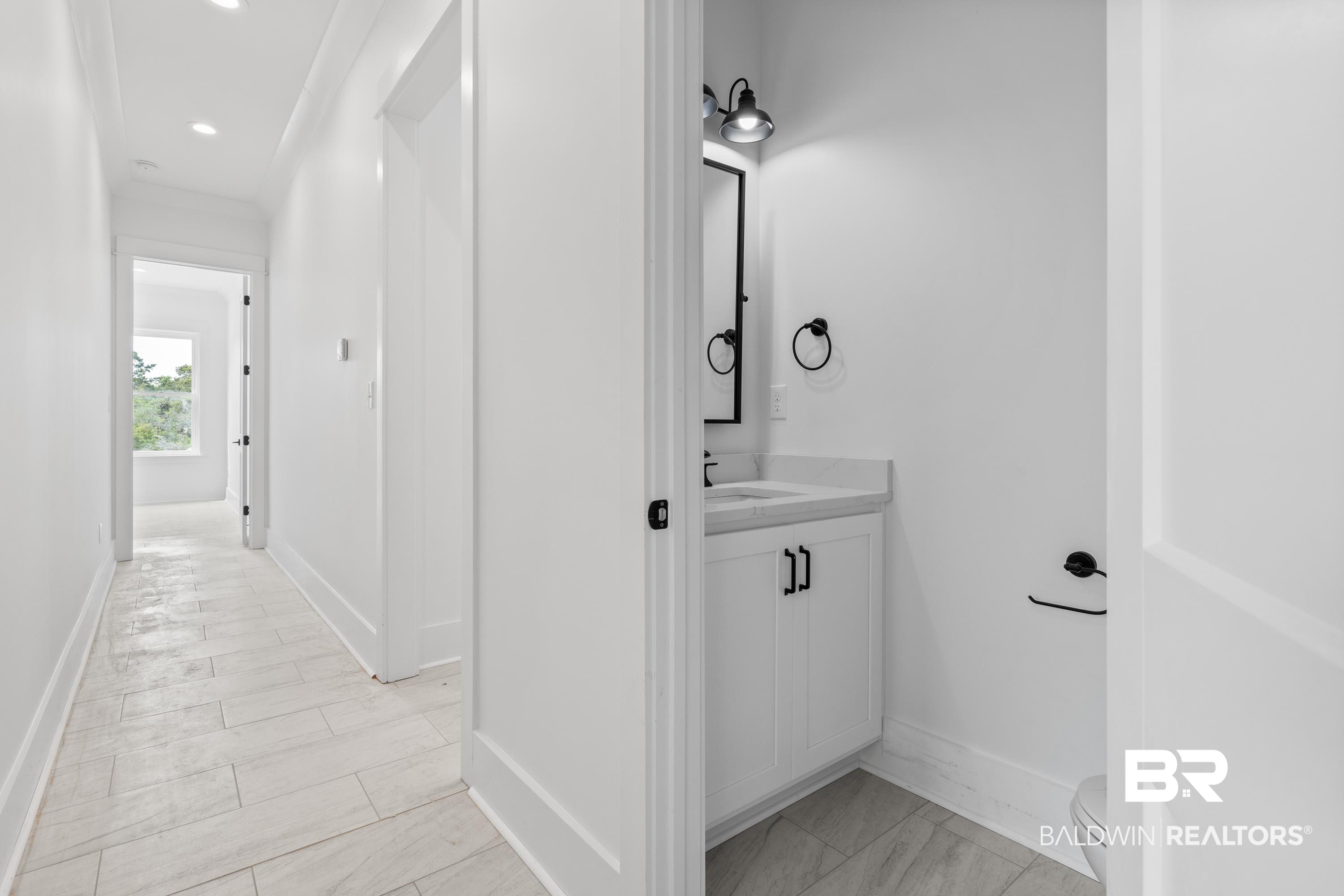 30650 Ono N Loop West Orange Beach, AL 36561 - Photo 31 of 38 Bathroom featuring vanity, toilet, baseboards, and recessed lighting