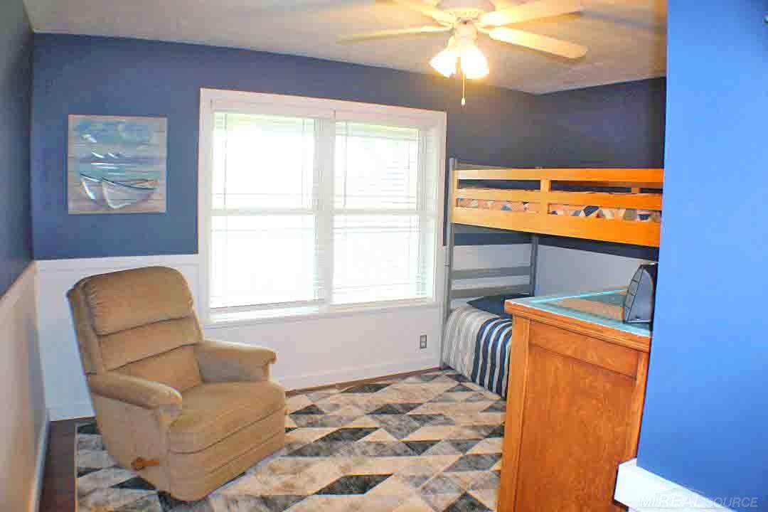 8577 Peck Road Marlette, MI 48453 - Photo 11 of 27 Across the hall from the main bathroom (13x13.2)
