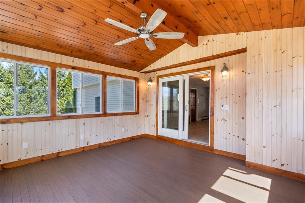270 Salem Road Dracut, MA 01826 - Photo 12 of 42 an empty room with wooden floor and windows