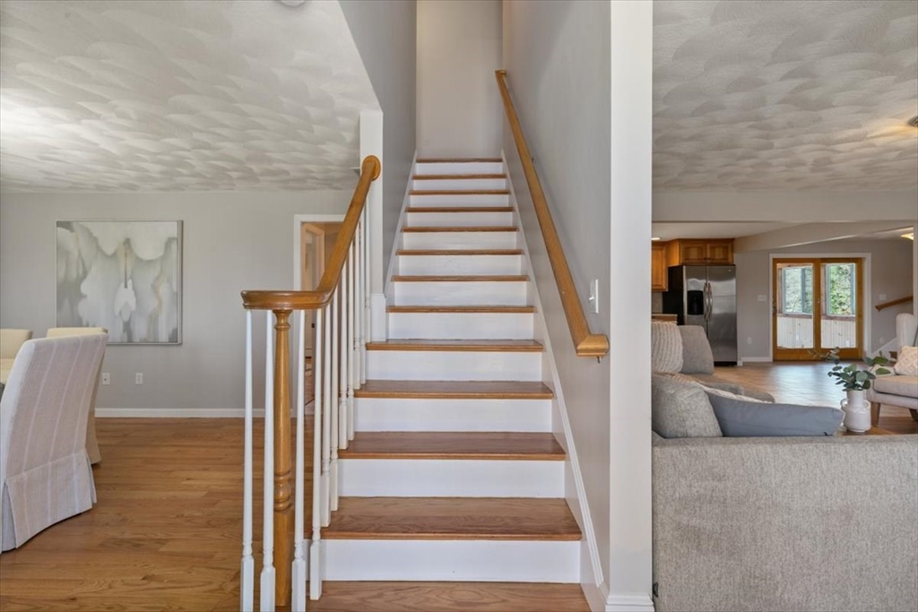 270 Salem Road Dracut, MA 01826 - Photo 2 of 42 a view of entryway and hall with wooden floor