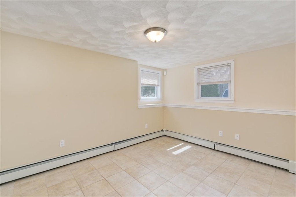 270 Salem Road Dracut, MA 01826 - Photo 26 of 42 an empty room with a empty space and a window