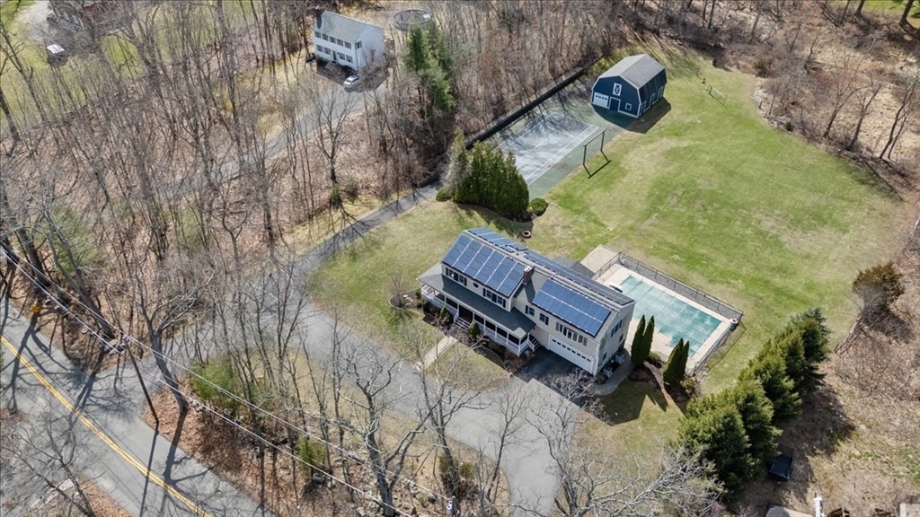 270 Salem Road Dracut, MA 01826 - Photo 36 of 42 a view of a yard with wooden fence