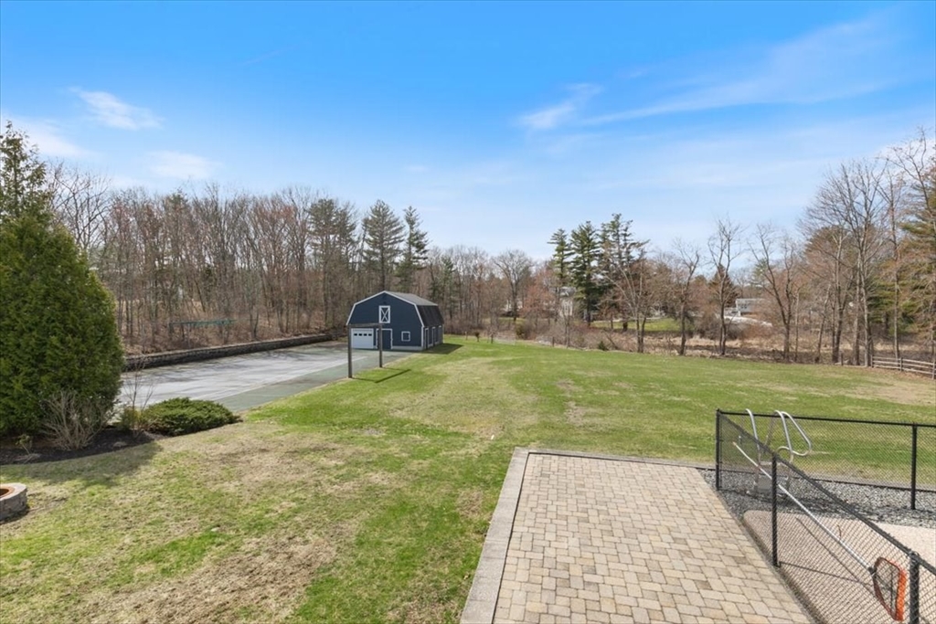 270 Salem Road Dracut, MA 01826 - Photo 38 of 42 a backyard of a house with lots of green space
