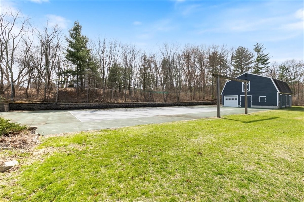 270 Salem Road Dracut, MA 01826 - Photo 39 of 42 a swimming pool with outdoor seating and yard