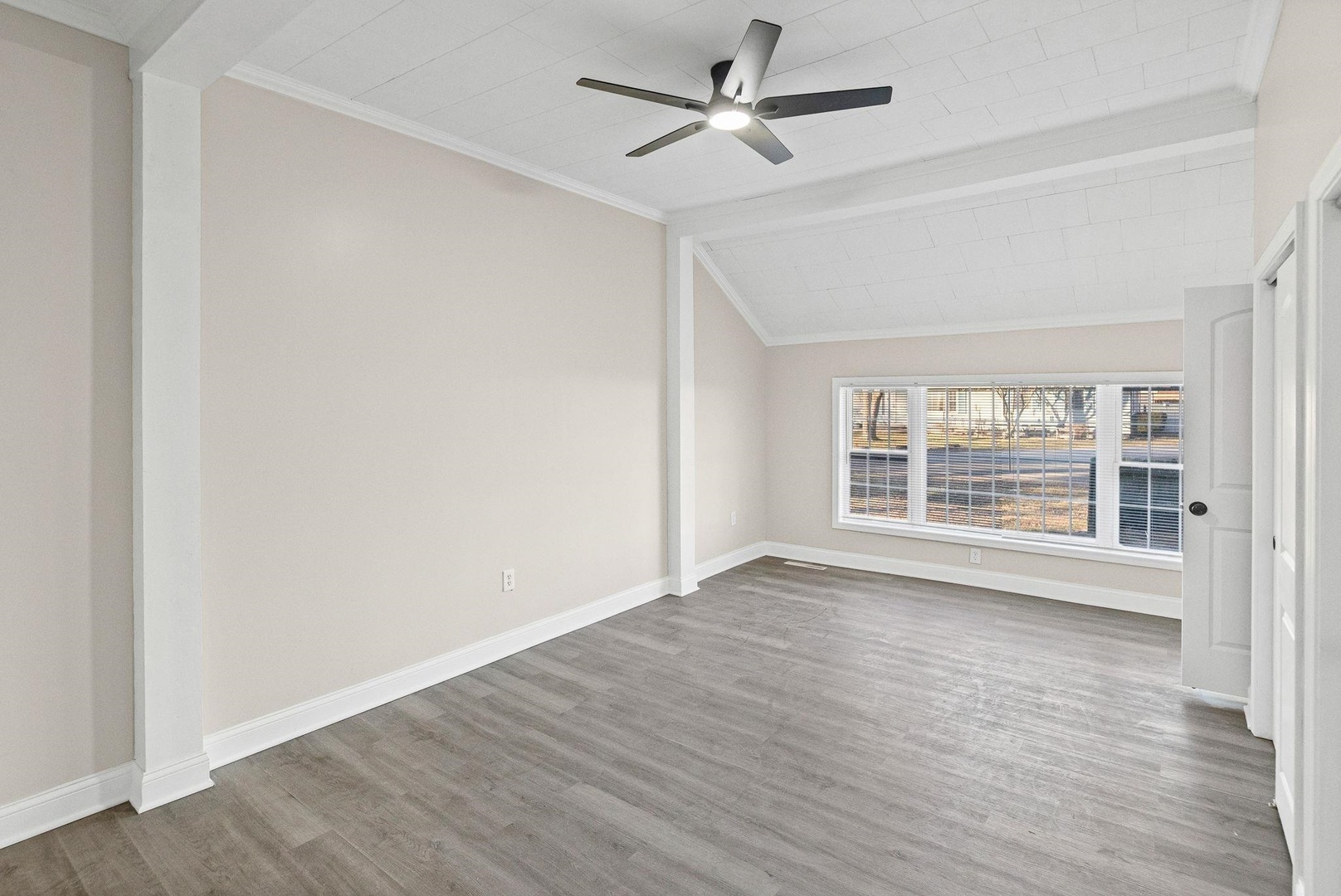 101 Marilyn Avenue Centralia, IL 62801 - Photo 17 of 34 a view of empty room with wooden floor and fan