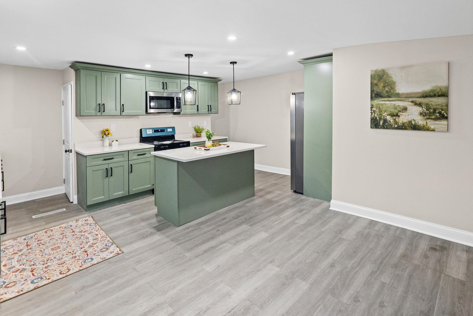 101 Marilyn Avenue Centralia, IL 62801 - Photo 22 of 34 a kitchen with stainless steel appliances granite countertop a stove and a refrigerator
