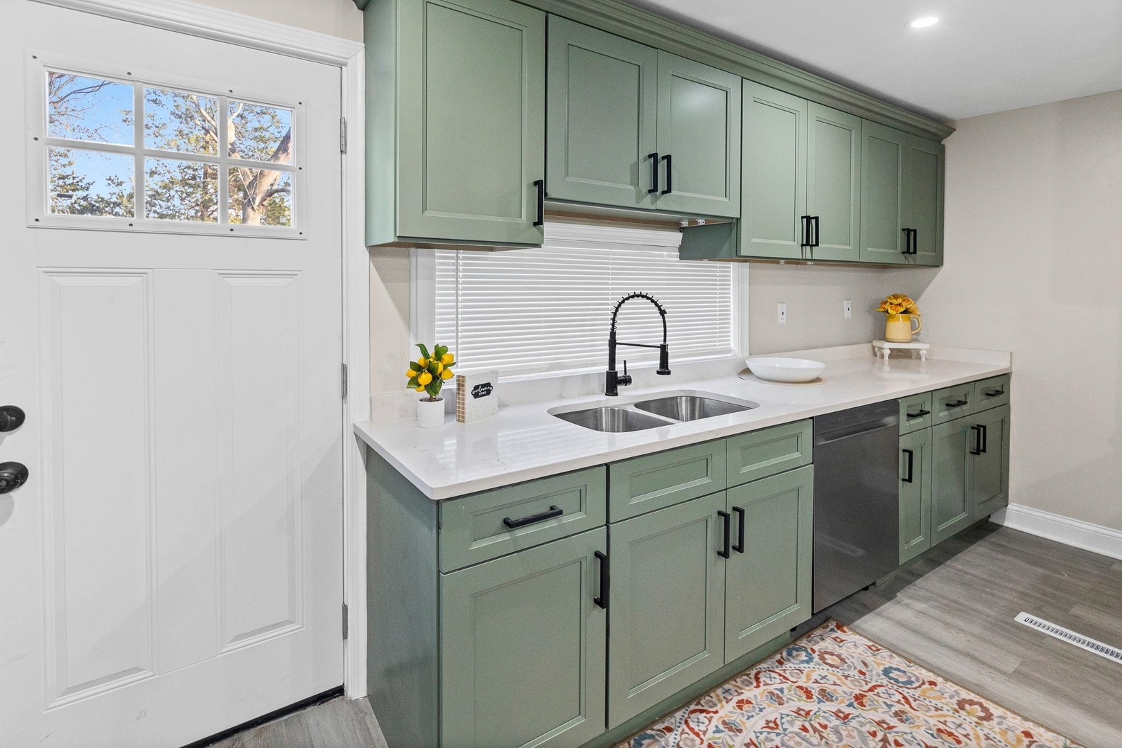 101 Marilyn Avenue Centralia, IL 62801 - Photo 24 of 34 a kitchen with a sink cabinets and wooden floor