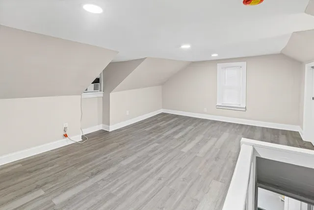 a view of entryway with wooden floor