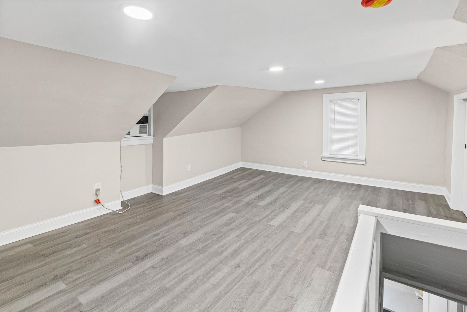 101 Marilyn Avenue Centralia, IL 62801 - Photo 27 of 34 an empty room with wooden floor and windows