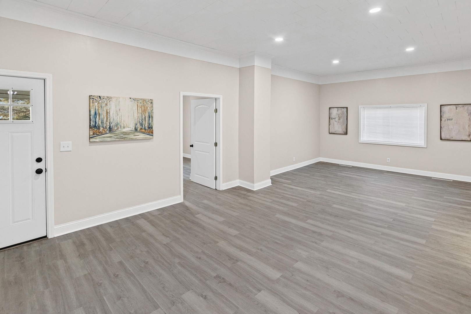 101 Marilyn Avenue Centralia, IL 62801 - Photo 9 of 34 a view of an empty room with wooden floor
