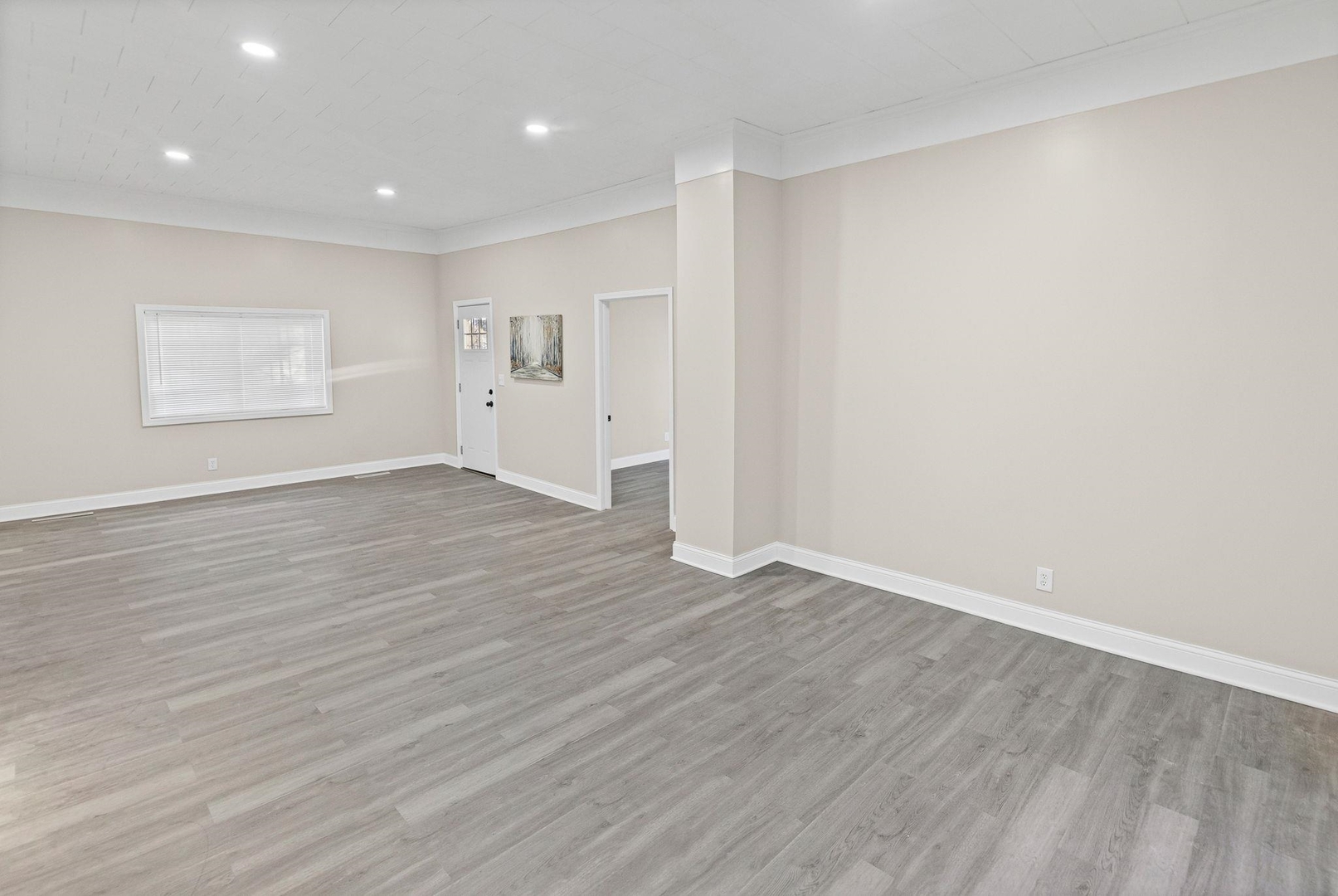 101 Marilyn Avenue Centralia, IL 62801 - Photo 10 of 34 a view of an empty room with wooden floor