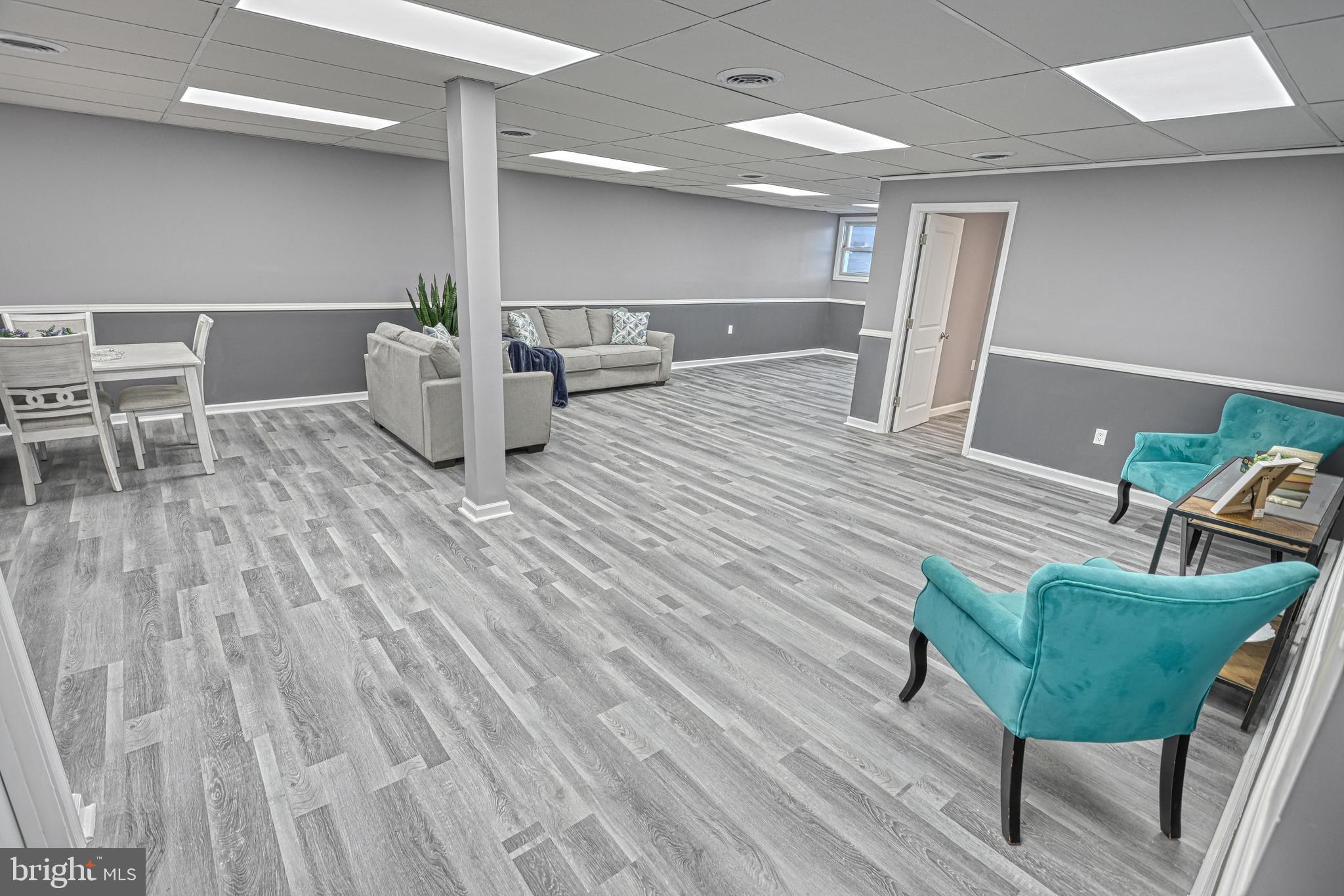 301 State Street Steelton, PA 17113 - Photo 13 of 44 a living room with furniture and a wooden floor