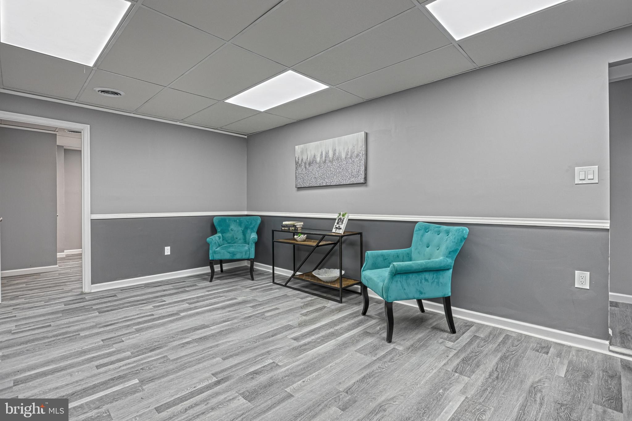 301 State Street Steelton, PA 17113 - Photo 14 of 44 a living room with furniture and a wooden floor