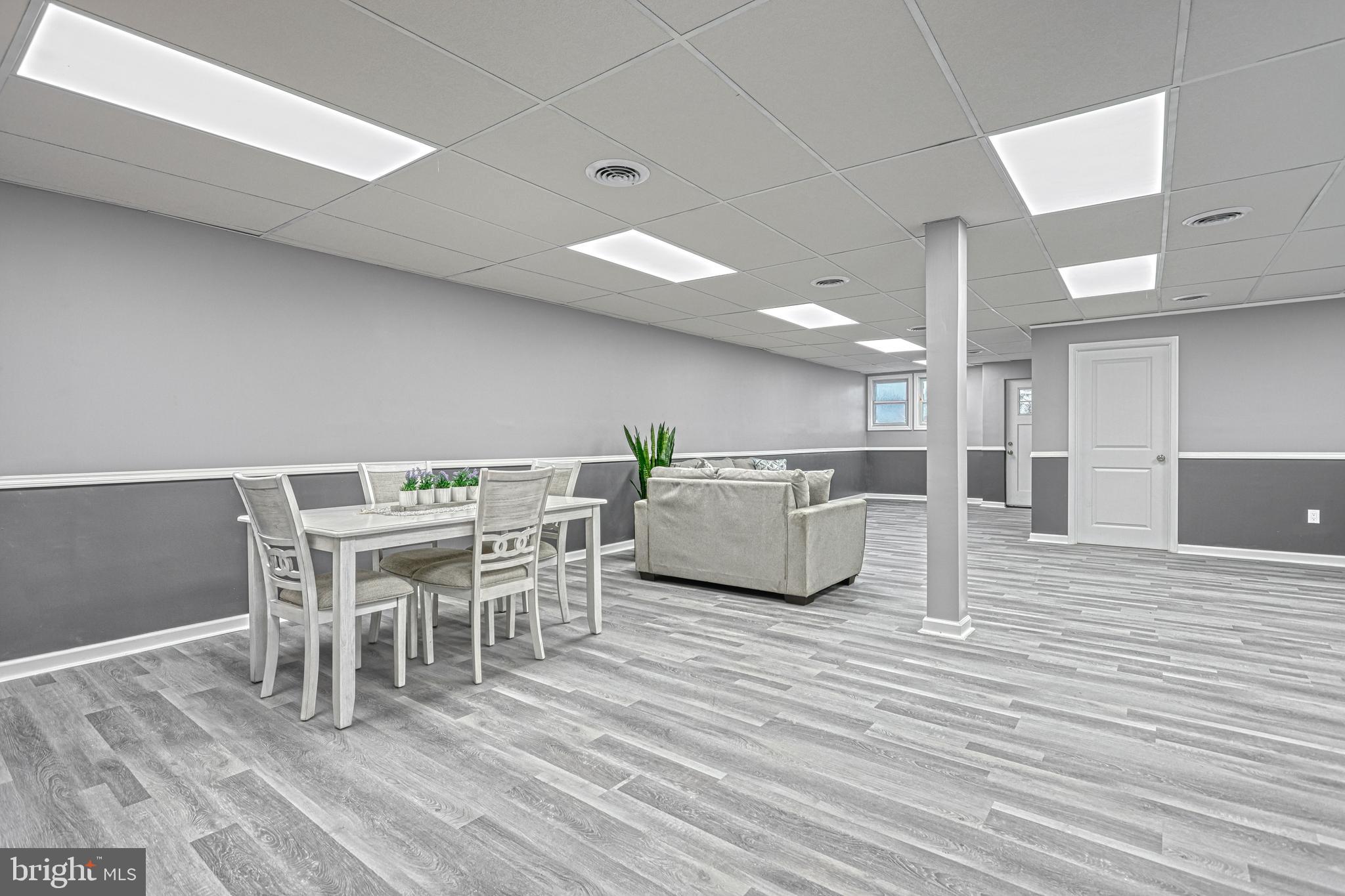 301 State Street Steelton, PA 17113 - Photo 16 of 44 a living room with furniture wooden floor and a kitchen view