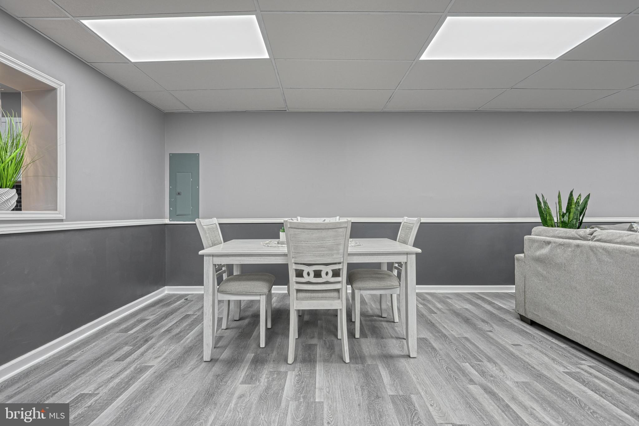 301 State Street Steelton, PA 17113 - Photo 18 of 44 a view of a dining room with furniture and wooden floor