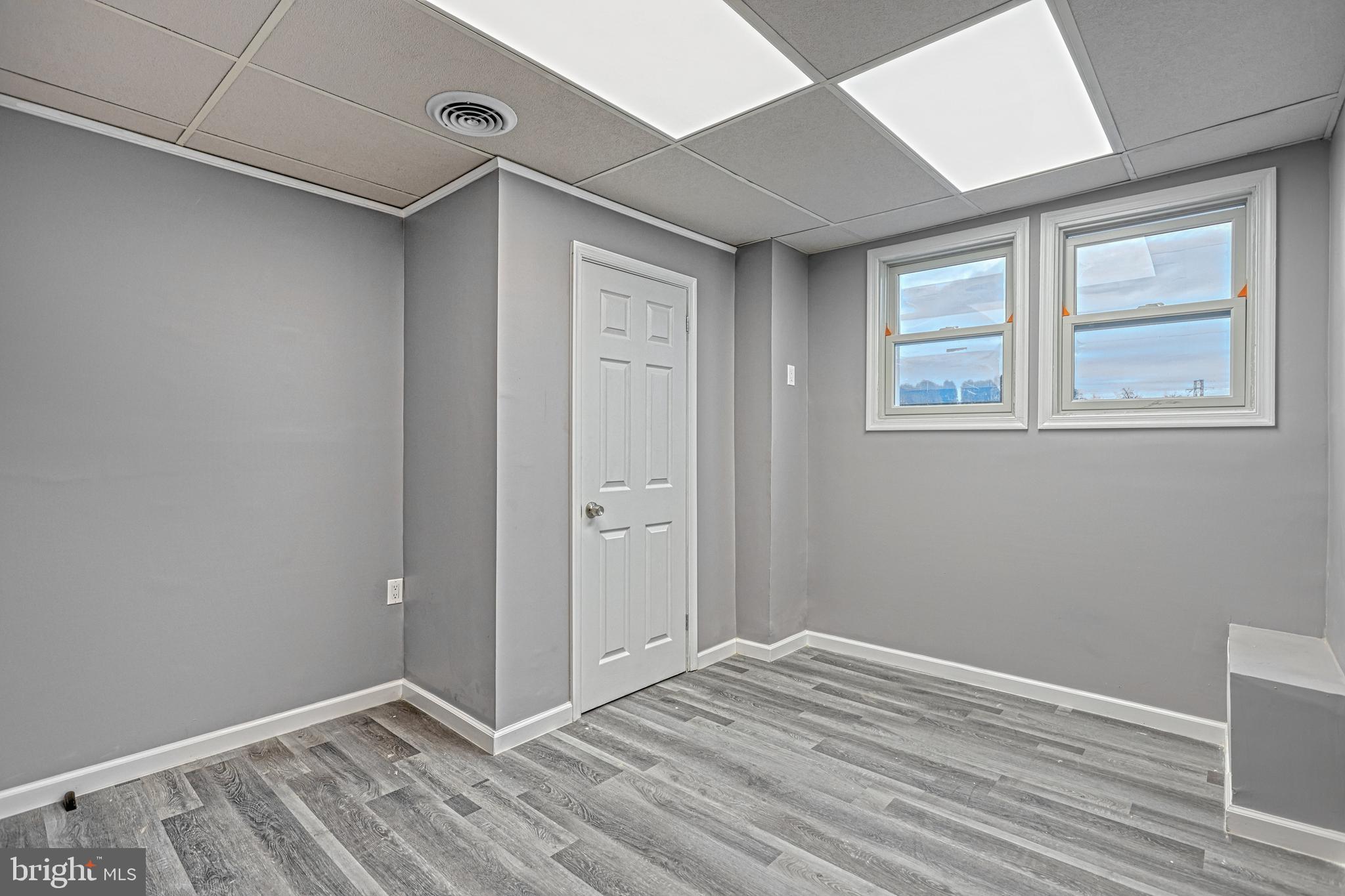 301 State Street Steelton, PA 17113 - Photo 29 of 44 a view of room with window and hardwood floor
