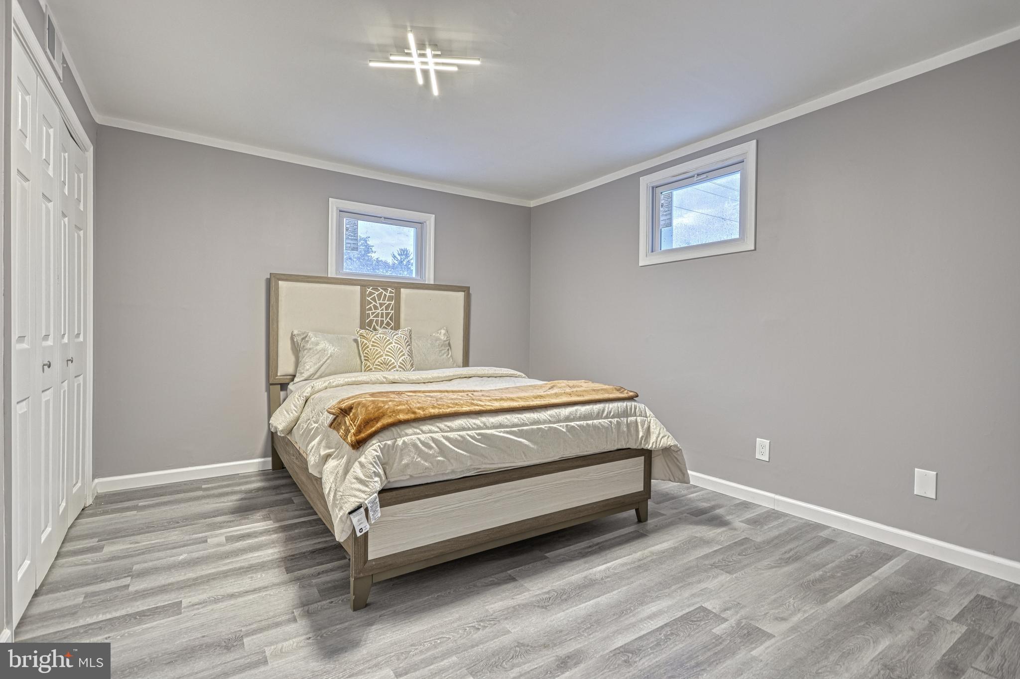 301 State Street Steelton, PA 17113 - Photo 37 of 44 a bedroom with a bed and a night stand